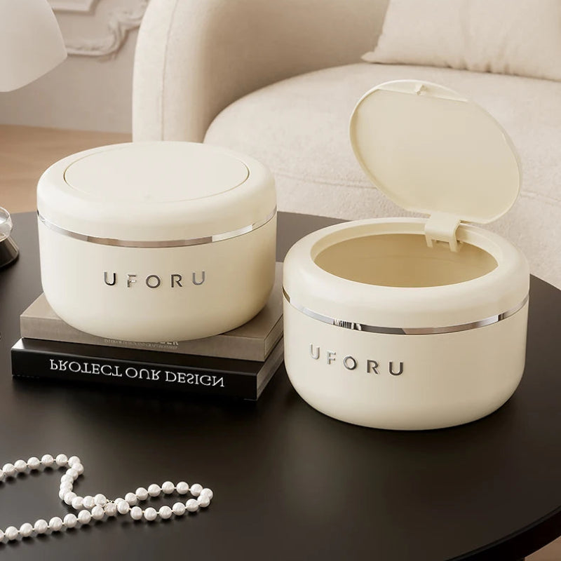 Le couvercle à pression ouvert de la Poubelle de chambre beige 2L