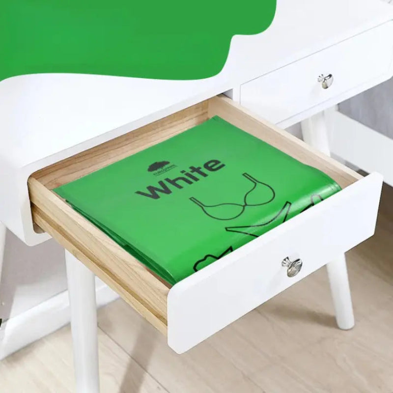 Poubelle à tri selectif 149L pliable rangée dans un tiroir